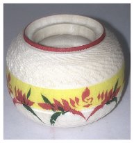 Matsuda Tomohiro (松田大弘) Ejiko Kokeshi, size of a half dollar with miniature spinning tops inside.
