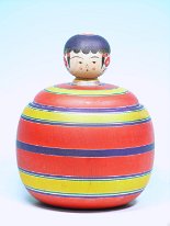 Sato, Seikō 10 (佐藤誠孝) This Ejiko Kokeshi is uniquely made with 4 additional interchangeable faces.