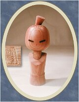 Aida Seihō (相田 晴峰) Tazurana on’nanoko - Naughty Girl: (1926 - 1998) started crafting Kokeshi in 1947. He is a multi award winning artist. This artist has passed away (1998), his...