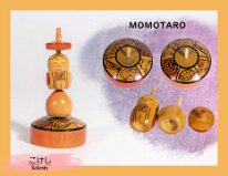 Kokeshi Toys Folklore: Momotaro by Yasushi Fukushima This Kokeshi could be categorized under several subjects. (1) Spinners (2) Folklore Toys or (3) Fortune Game
