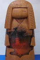 Aoki Ryoka 翆華作 I believe this Kokeshi to be by Aoki I have included the Japanese Name. If I am mistaken please contact me with the correct information.